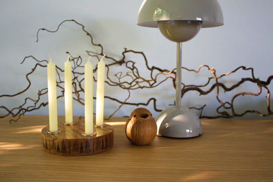 Handmade solid oak candle holder with four brass inserts